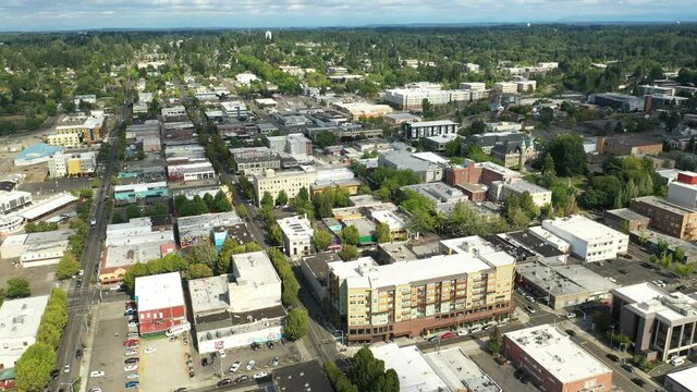 Cinematic 4K aerial drone dolly out shot of the Historic district in Olympia near the Washington State Capitol Building and Campus, Capitol Lake, Olympia Yacht Club in Washington