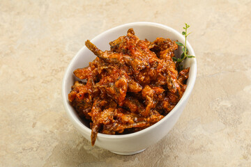 Canned anchovy in tomato sauce