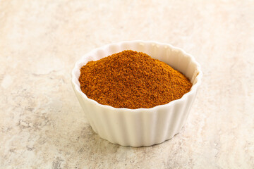 Dry Paprika powder in the bowl