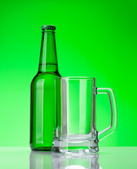 Beer bottle and empty glass beer