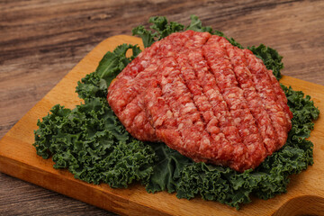 Raw beef burger cutlet for cooking