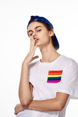 woman wearing white t-shirt lgbt flag inventor community