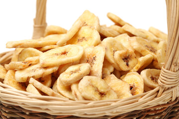 Banana chips on white background