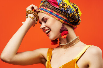 beautiful woman in multicolored turban attractive look Jewelry isolated background