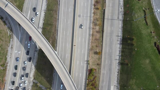 Drone shot going up at the crossroad intersection between I-64 and I-170 in St. Louis, MO