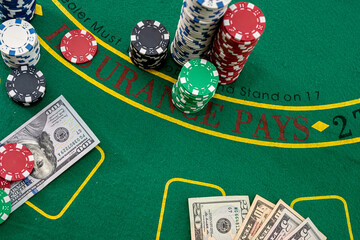 Poker chips with us dollar bills for casino game
