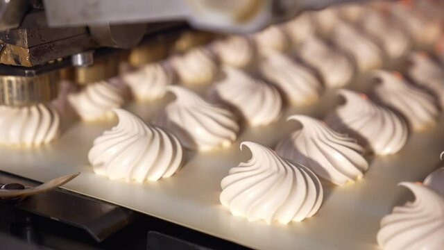 Industrial tasty marshmallow conveyor. Food sweety conveyor line.