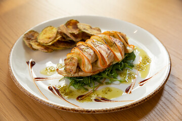 Primavera stuffed chicken served on a plate