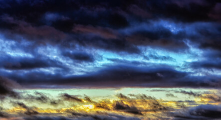 Fototapeta na wymiar A background of dark clouds before a storm