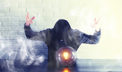 A man with a fortune teller ball