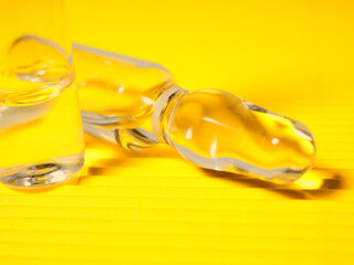 banner several ampoules on a yellow background.