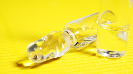 banner several ampoules on a yellow background.