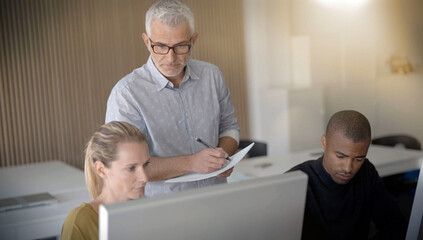 Obraz premium team of three people working on a training