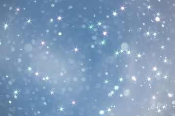 blue snowfall bokeh background, abstract snowflake background on blurred abstract blue