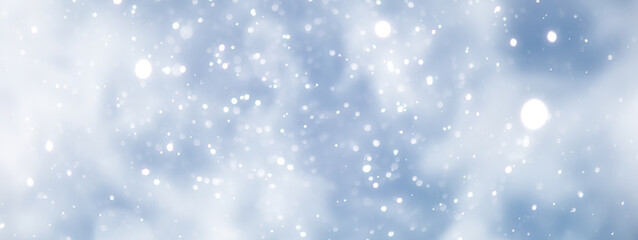 blue snowfall bokeh background, abstract snowflake background on blurred abstract blue