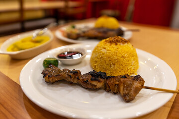 Popular Filipino food pork inasal with Java rice