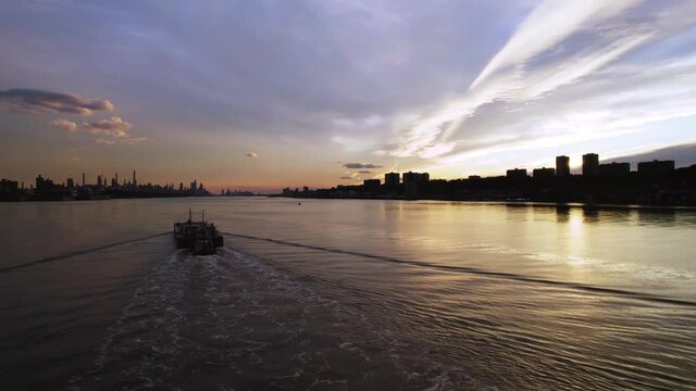 Sunset shot of ship entering New York City