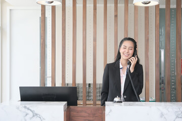 Asian girl receptionist in lobby
