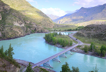 Obraz na płótnie Canvas A bridge in the Altai Mountains