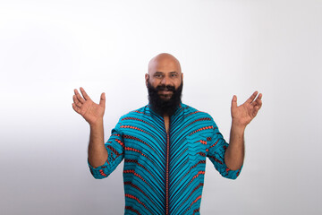 Fototapeta premium Surprised Indian healthy bald beard man. People lifestyle concept. Keeping mouth open spreading hands
