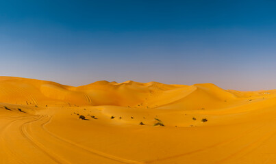 Orange sands desert resort in the Empty Quarter (Rub' al Khali) area of Abu Dhabi, United Arab...