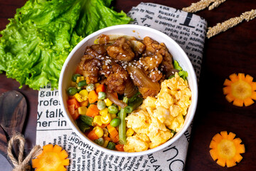 Indonesia style rice bowl, contain chicken katsu, egg, and vegetables