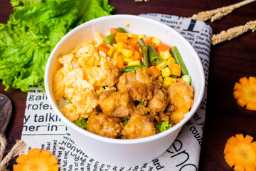 Indonesia style rice bowl, contain chicken katsu, egg, and vegetables