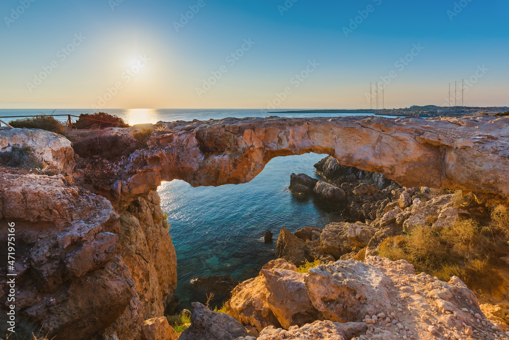 Poster Famous stone Sin Bridge at sunrise in Ayia Napa Cyprus