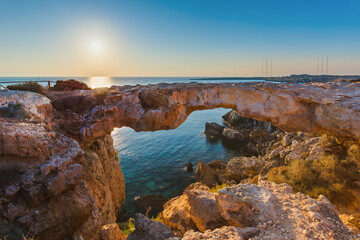 Obraz premium Famous stone Sin Bridge at sunrise in Ayia Napa Cyprus