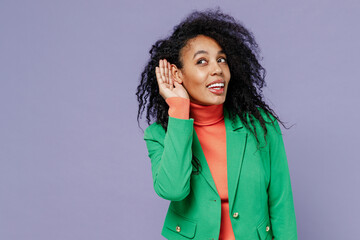 Curious nosy young black curly woman 20s wears green shirt try to hear you overhear listen intently...