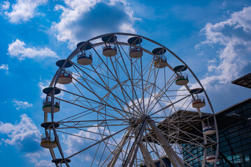 Fototapeta premium ferris wheel against sky in Enugu
