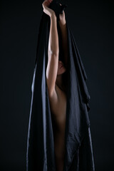 beautiful woman brunette underwear silhouette on black background