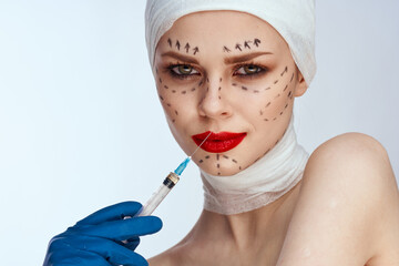 woman in blue gloves syringe in hands contour on the face lifting studio lifestyle