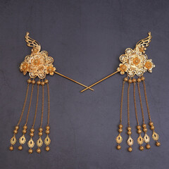 Chinese hairpin hair clips on a grey concrete background. Chinese traditional jewelry. flat lay