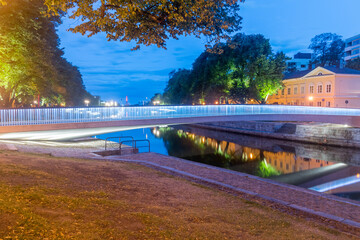 Fototapeta na wymiar Illuminated library bridge (Kirjastosilta orBiblioteksbron) in Turku, Finland.