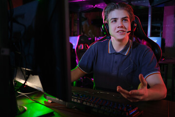Cyber sport. Team play. Professional cybersport player training or playing online game on his PC