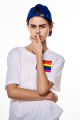woman wearing white t-shirt lgbt flag inventor community