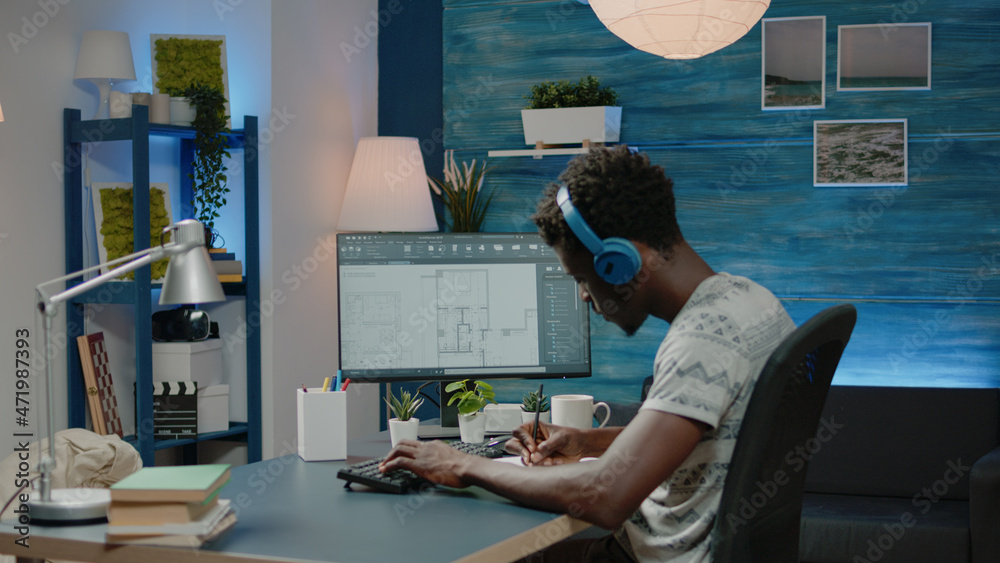 Poster person working with sketch of blueprint plan on computer to create floor layout for building constru