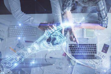 Double exposure of man and woman working together and technology theme drawing. Computer background. Top View. High tech concept.