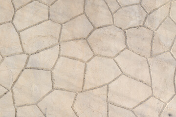 Abstract geometric pattern on a concrete surface.