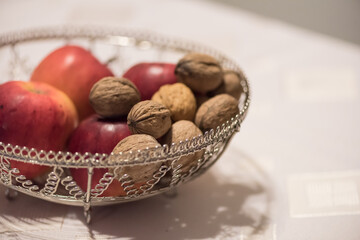 Christmas decoration. Healthy walnuts with apples