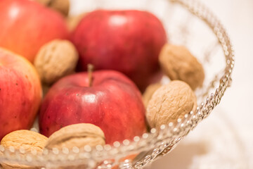 Christmas decoration. Healthy walnuts with apples