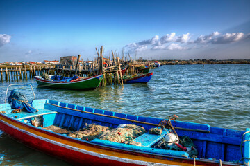 Fototapeta na wymiar Colorful Fishing Boats at Porto Palafitico, Carrasqueira, Portugal