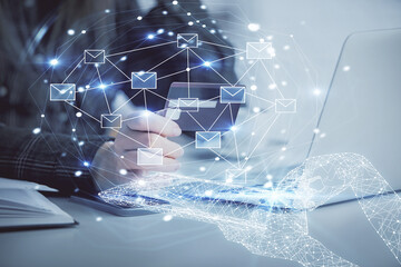 Multi exposure of woman on-line shopping holding a credit card and envelop drawing. e-commerce concept.