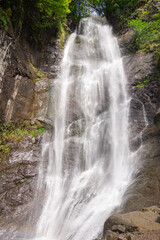Makhuntseti waterfall, one of the highest waterfalls in Ajara. Point in a Acharistsqali river, where water flows over a vertical drop or a series of steep drops