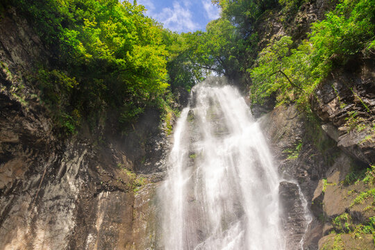 Makhuntseti waterfall, one of the highest waterfalls in Ajara. Point in a Acharistsqali river, where water flows over a vertical drop or a series of steep drops