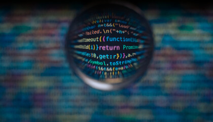 Software developer code. Abstract computer script code. Code in a glass ball.