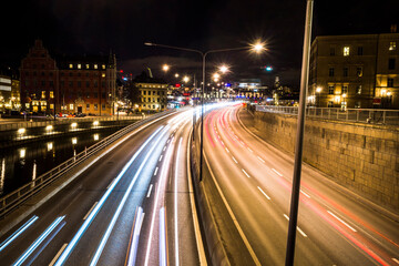 Stockholm, Sweden Traffic light trails from the Riddarholmen bridge at night.