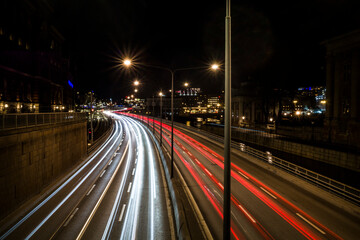 Stockholm, Sweden Traffic light trails from the Riddarholmen bridge at night.
