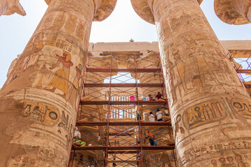 Luxor, Egypt - September 21, 2021: Cleaning of the 134 columns in the Great Hypostyle Hall at the...